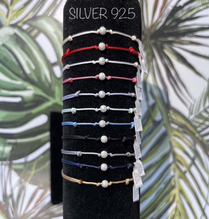 Дамски гривни от бижутерски конец и елемент-злато или сребро