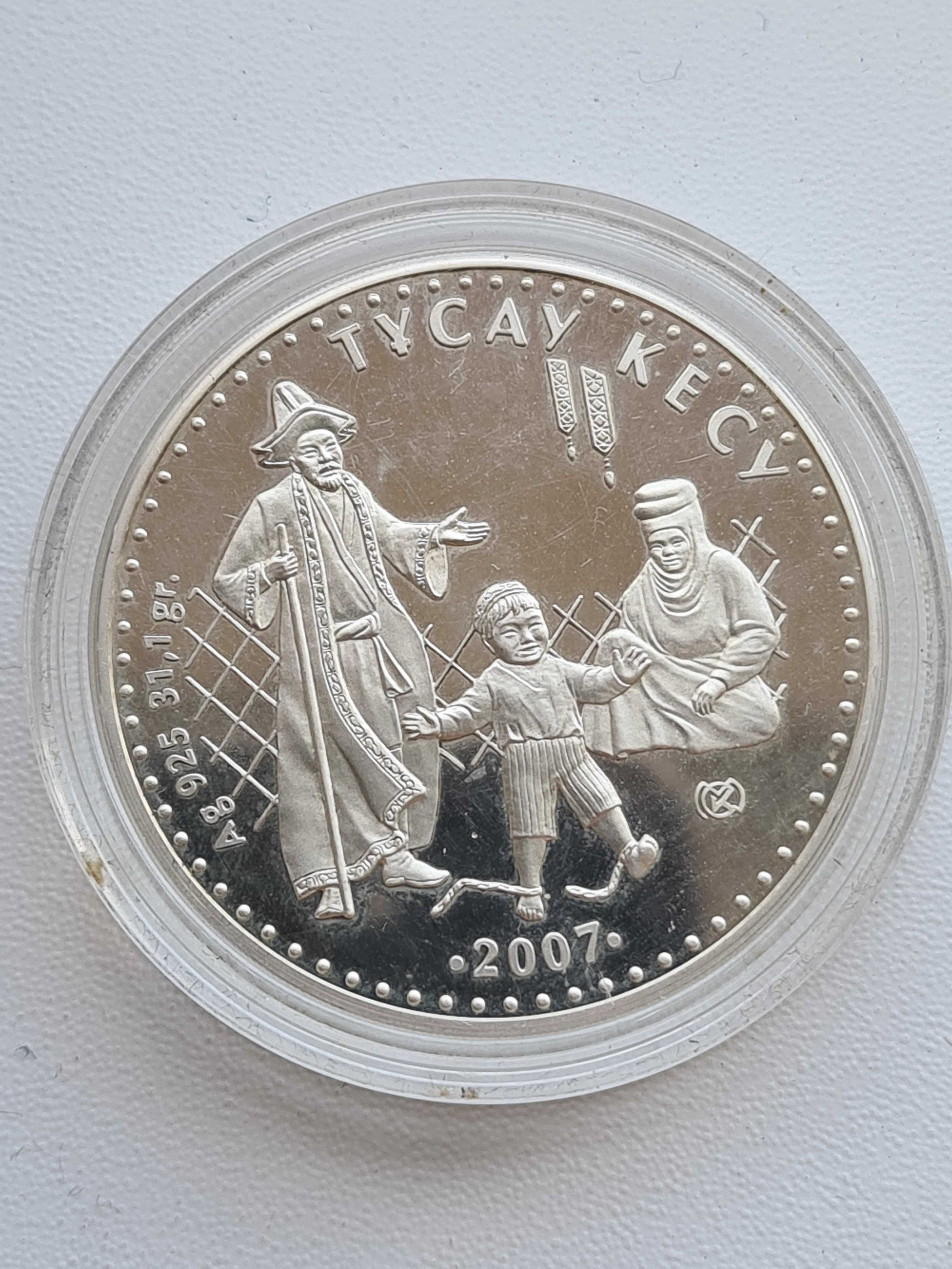 Монета "Тусау кесу".