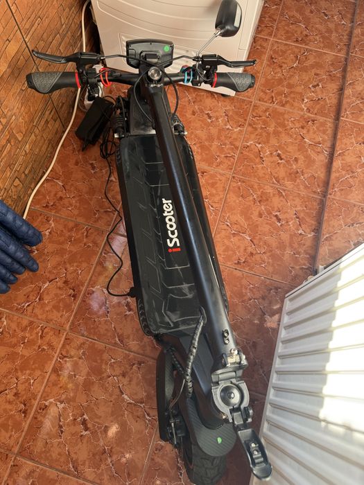 Trotineta aproape noua