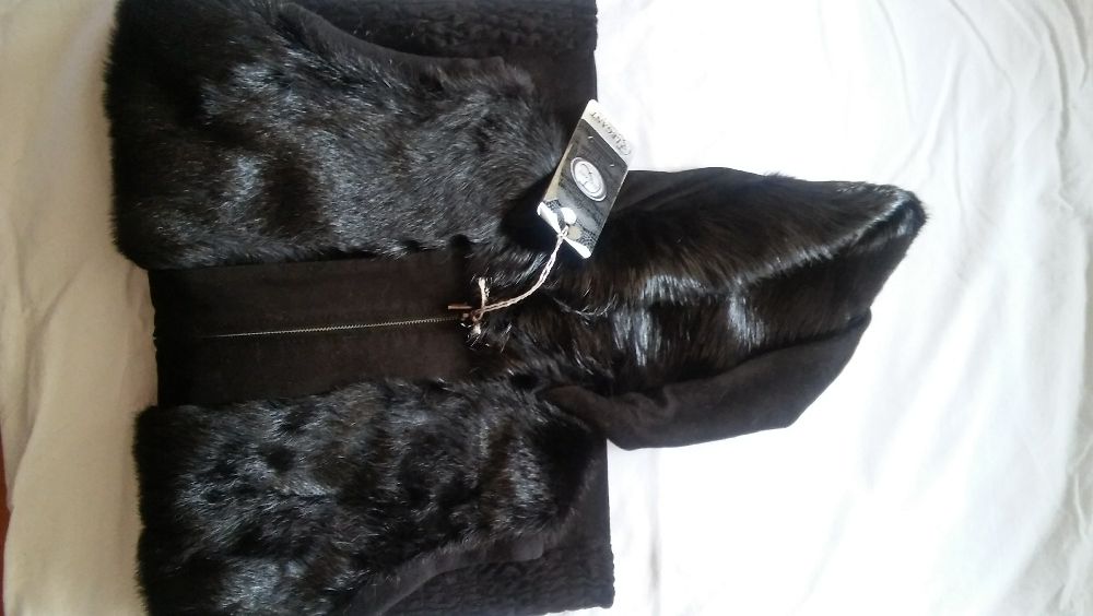 Чисто нов изцяло от ествена кожа - косъм и велур