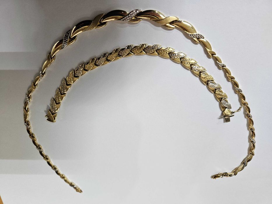 Aur Set Colier 14 K, 300 lei gramul.