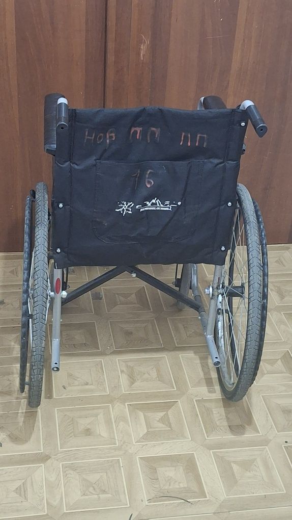 Инвалидная коляска