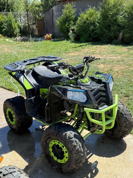 ATV verde sau albastru