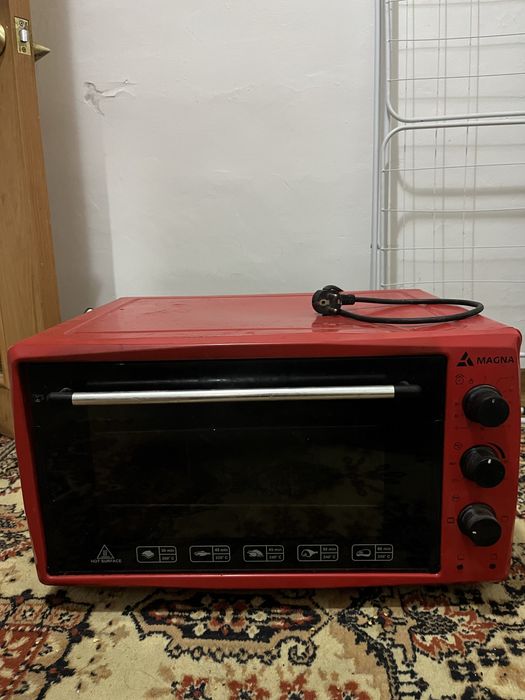 Продам духовку Magna
