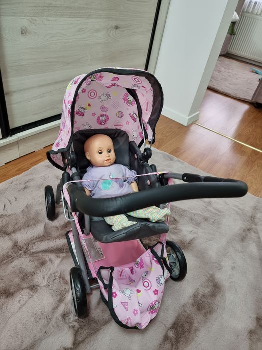 Carucior de jucarie +geanta + bebe
