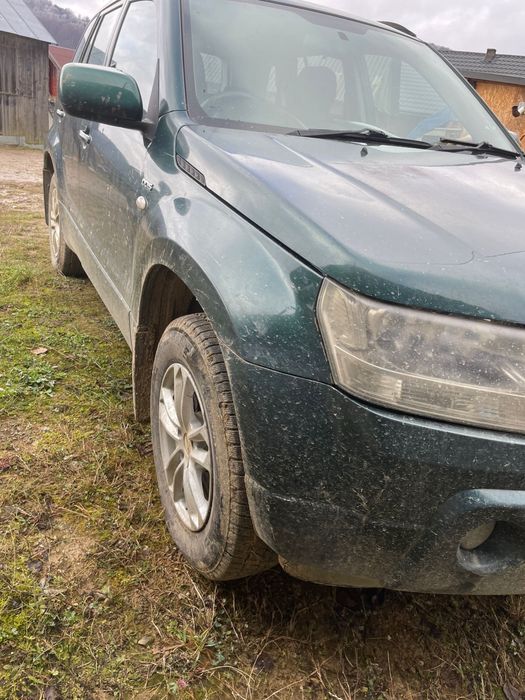 Vand Suzuki Grand vitara volan pe dreapta.