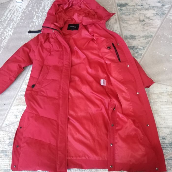 Продам женский зимний пуховик