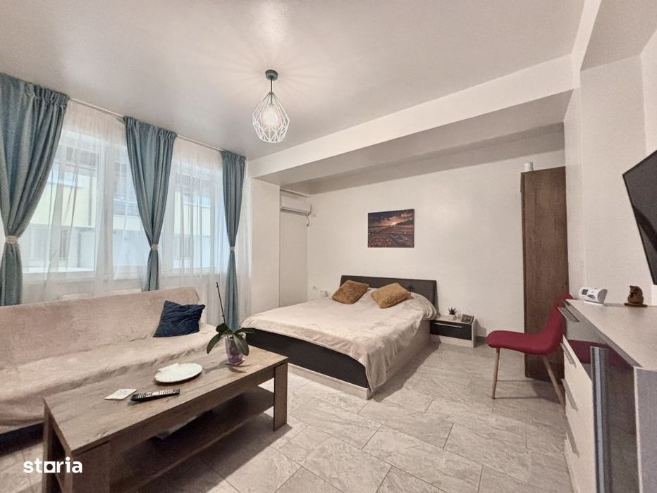 Studio modern langa plaja – termen lung