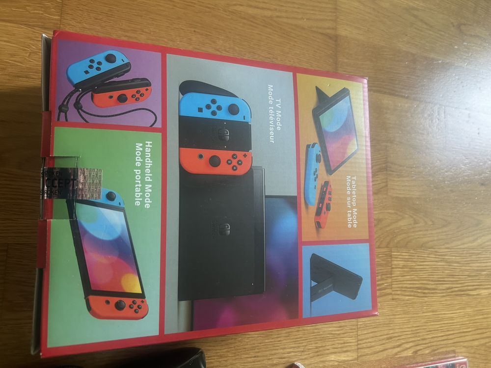 Nintendo Switch нов модел плюс 4 броя нови игри