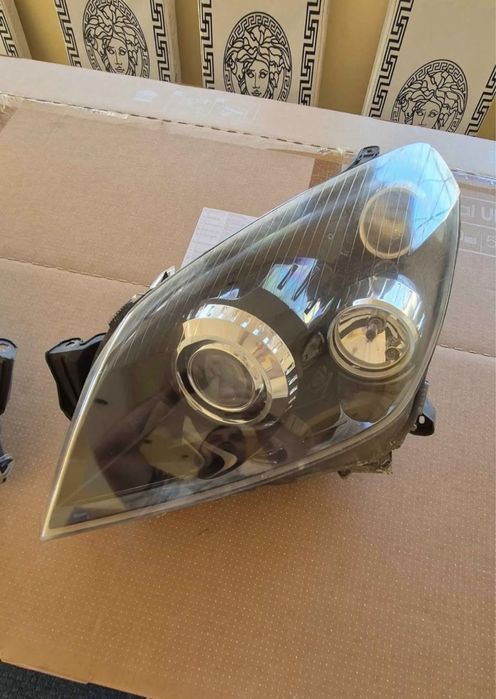 Faruri xenon AFL opel astra h impecabile