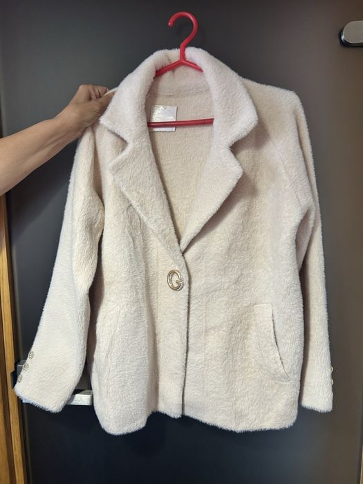 Чисто ново палто