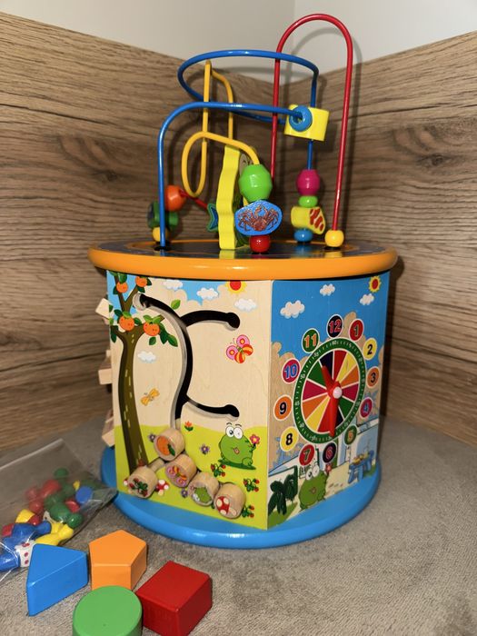 Дидактически Монтесори дървен куб с осем игри