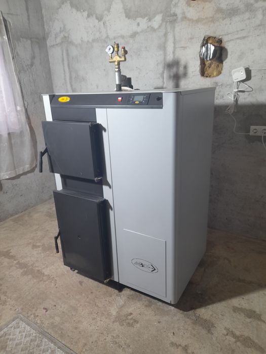 Vând centrala Combo 40 kw pelet/ lemn