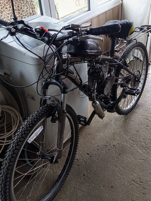 Vând bicicletă cu motor