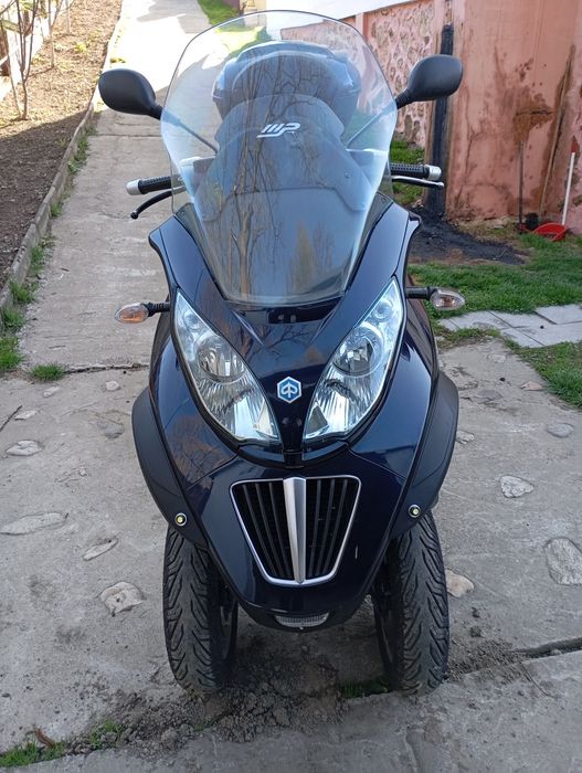 Piaggio mp3 LT cat A,B/schimb moto