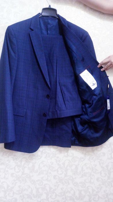 Продам новый костюм с брюками