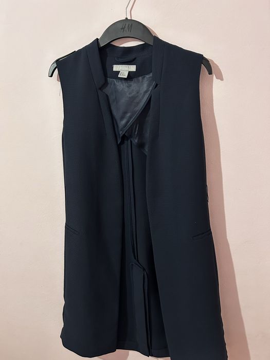 Vesta lunga eleganta