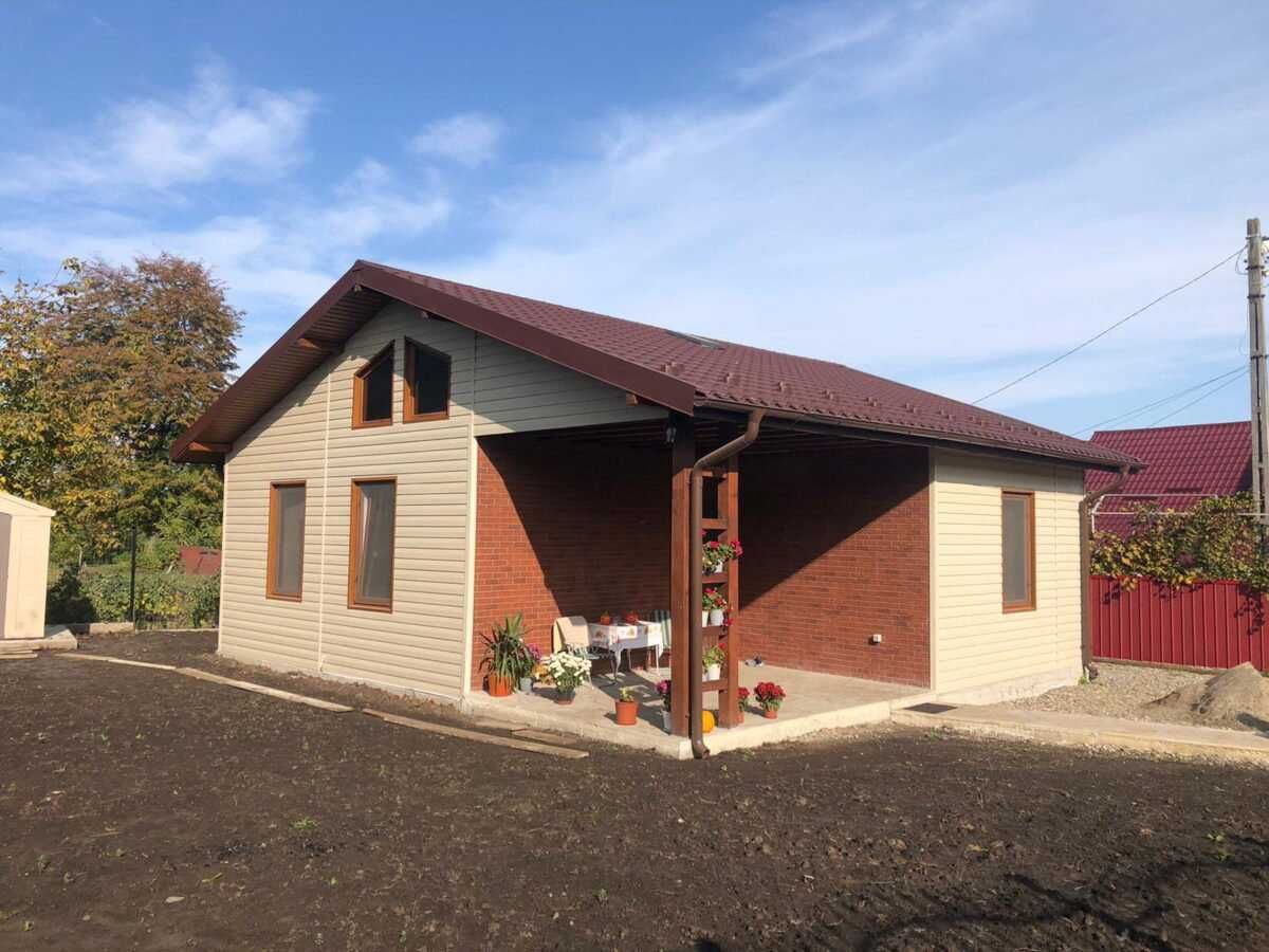 Casa modulara si garaje auto din structura metalica si panou sandwich