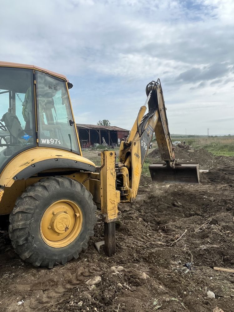 Buldoexcavator Komatsu WB 97S-schimb