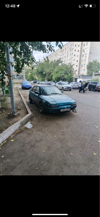 Машина мазда 323