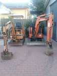 Miniexcavatoare CASE și Hitachi