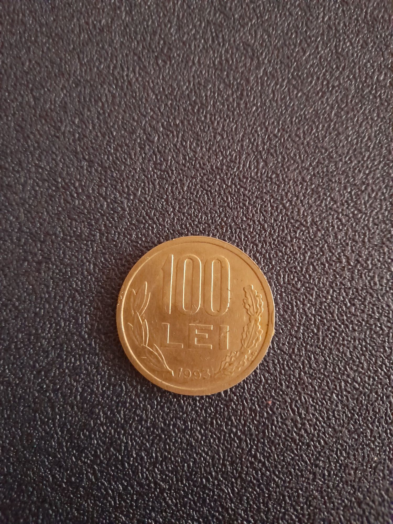Moneda 100 lei .
