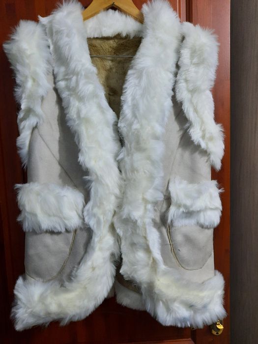 Меховая жилетка новая