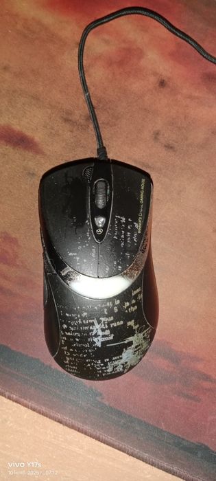Продам игровую мышь в среднем