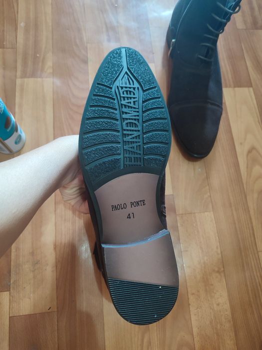 Продам новые сапоги