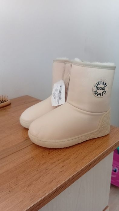 Новые сапоги Tiflani