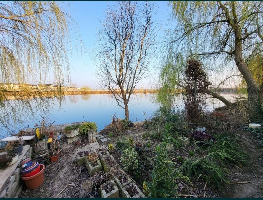 Teren cu toate utilitatile si deschidere la lac - Tunari