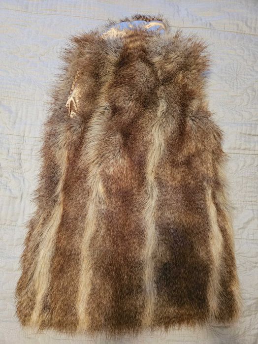 Комплект от пухкав елек и гети