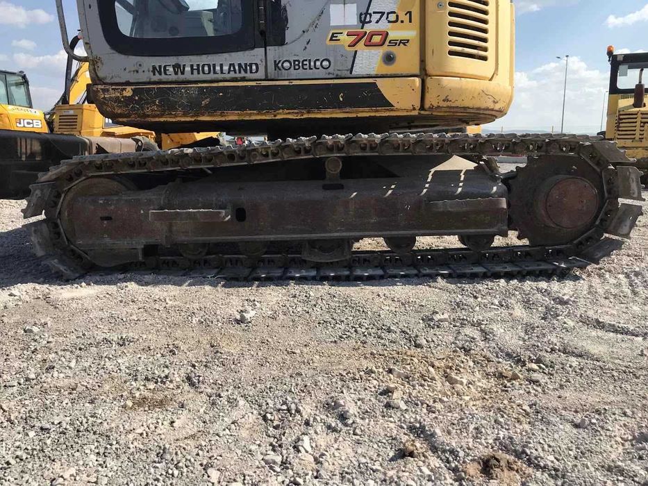 Багер New Holland Kobelco E70SR-1ES 8000кг