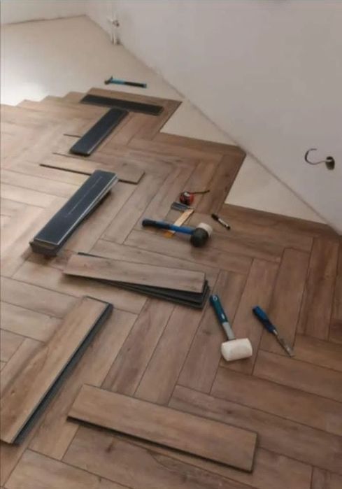 Укладка ламината от 1300 тг укладка ёлочки кварцвенила паркета Астана
