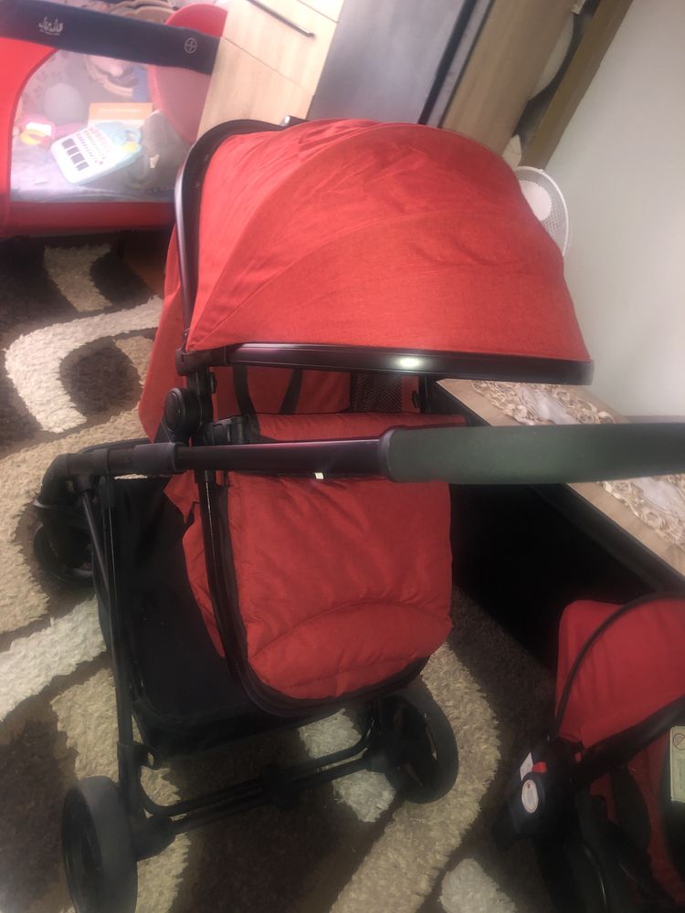 Carucior 3in 1  culoarea rosi