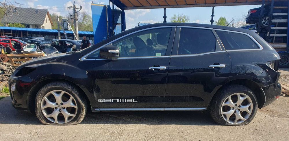 Dezmembrez Mazda CX7 2.2D 2012