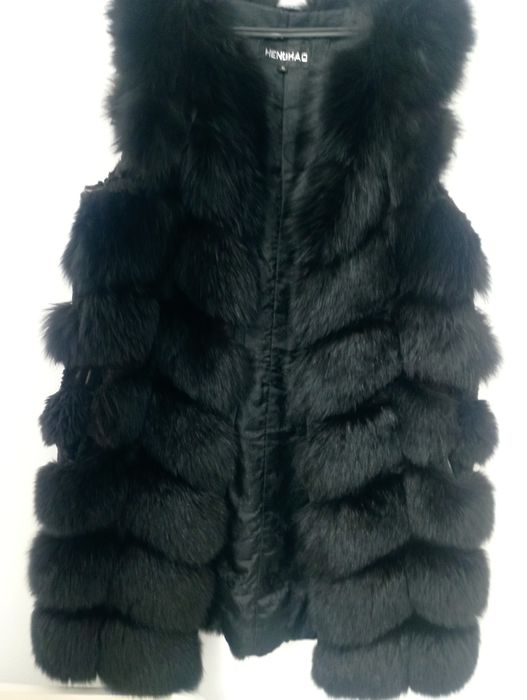 Продам меховую жилетку
