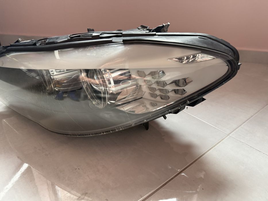 BMW F10 фар ляв bi-xenon завиващ оригинален