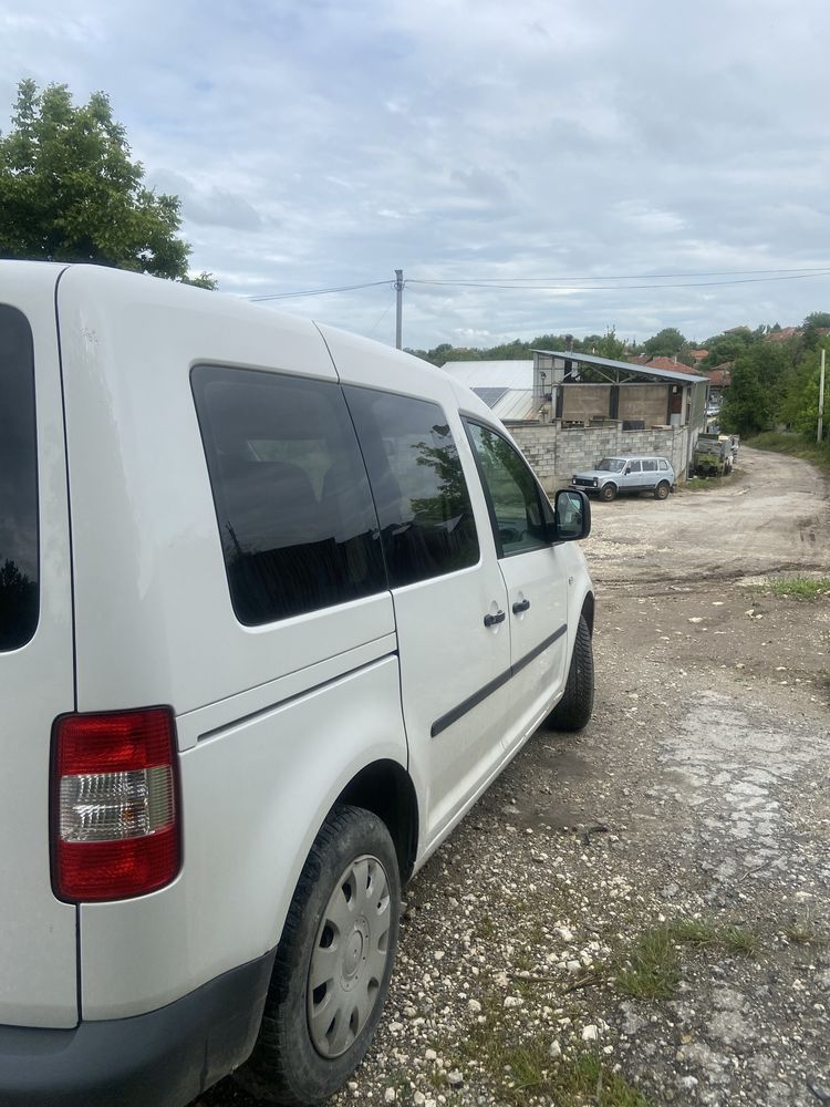 VW Caddy 2.0метан-Бензин