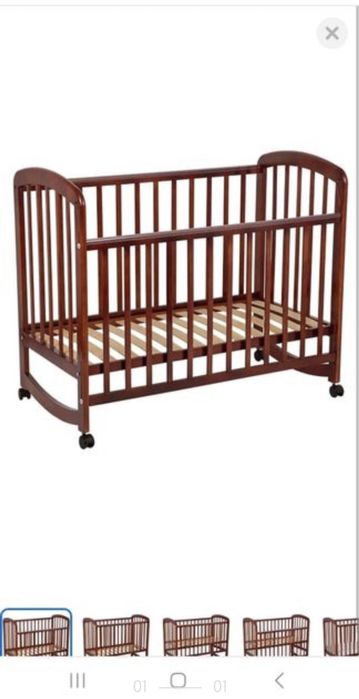 Детская кроватка из дерева