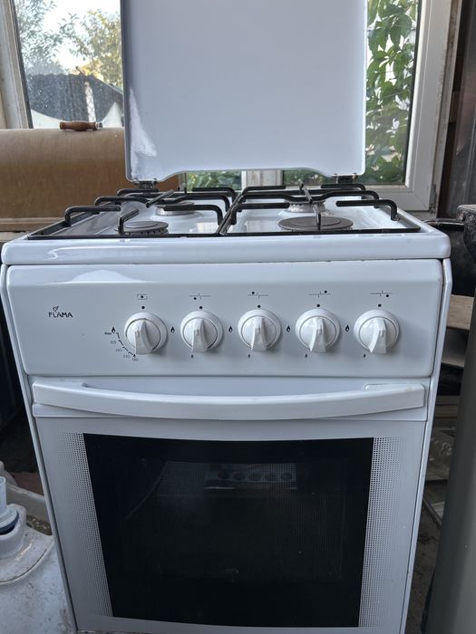 Газ плита.Четырехкомфорочная.