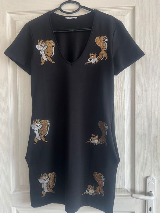 Дамска рокля с джобчета.