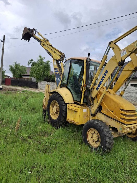 Buldoexcavator Komatsu