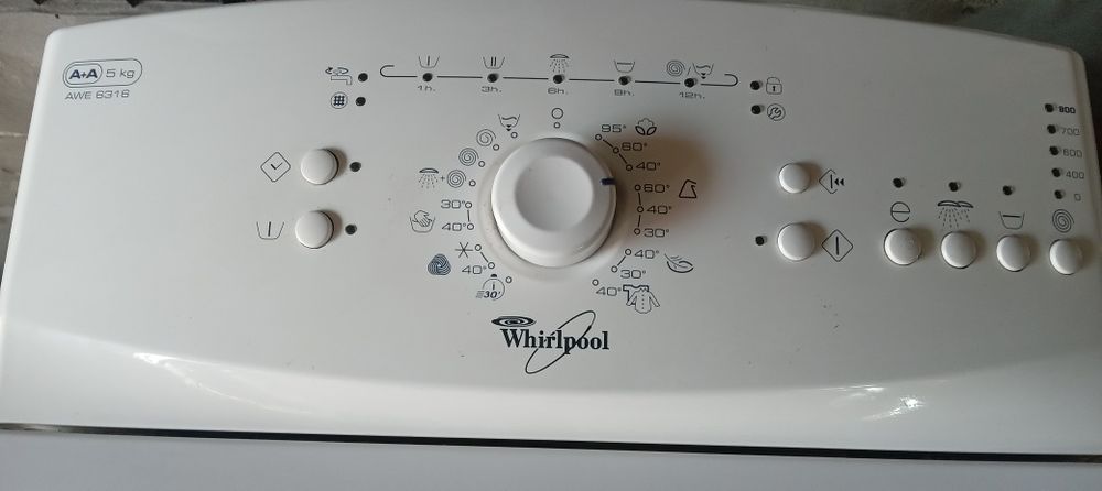 Mașină cu încărcare verticală