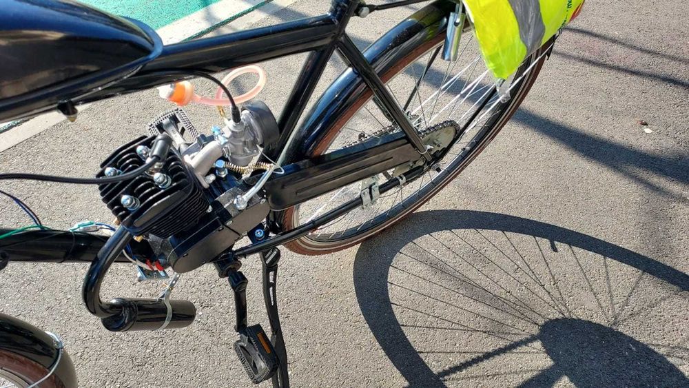 Bicicleta cu motor pe benzina,noua 0  km