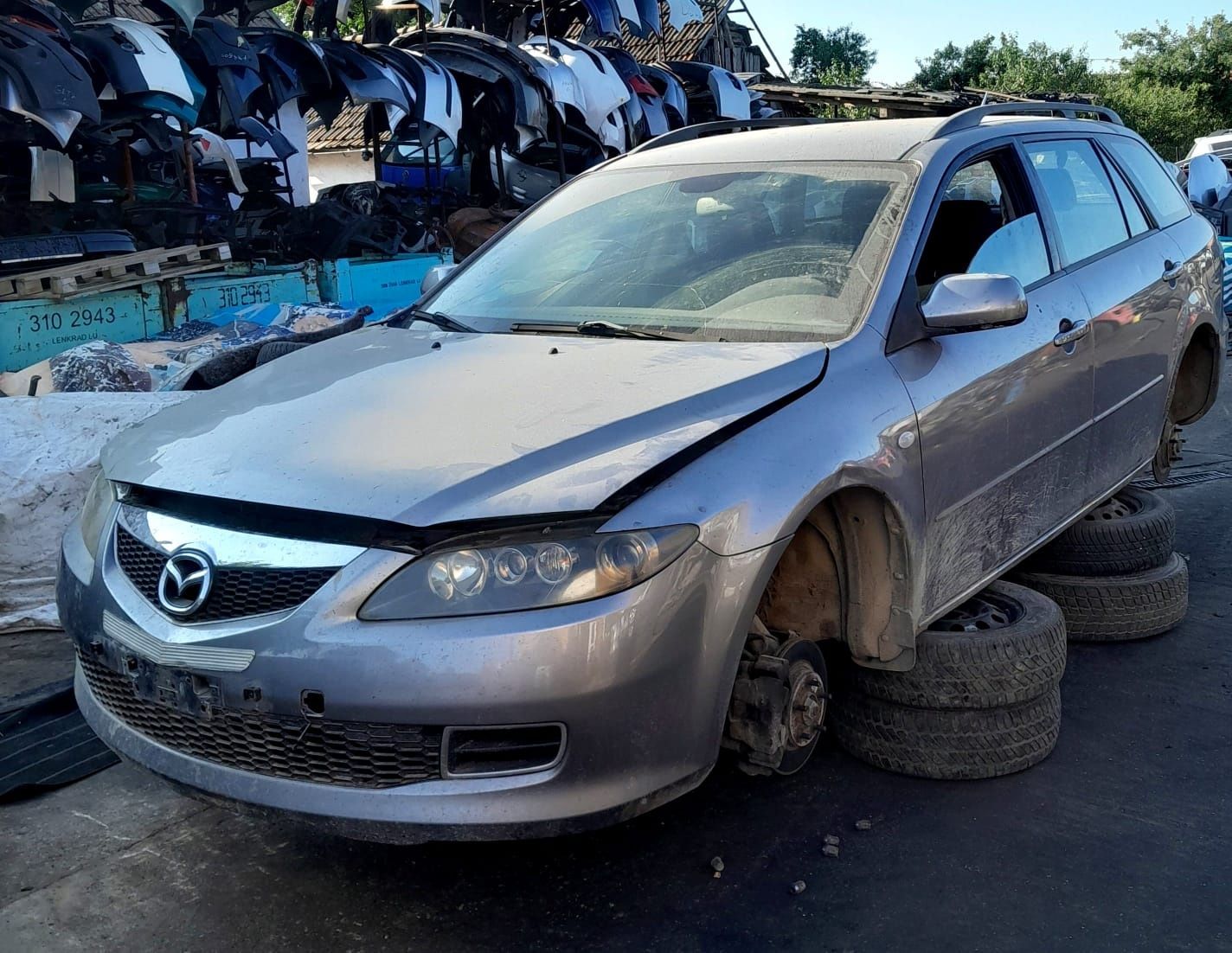 Aripa stanga/dreapta Mazda 6 an 2001-2007