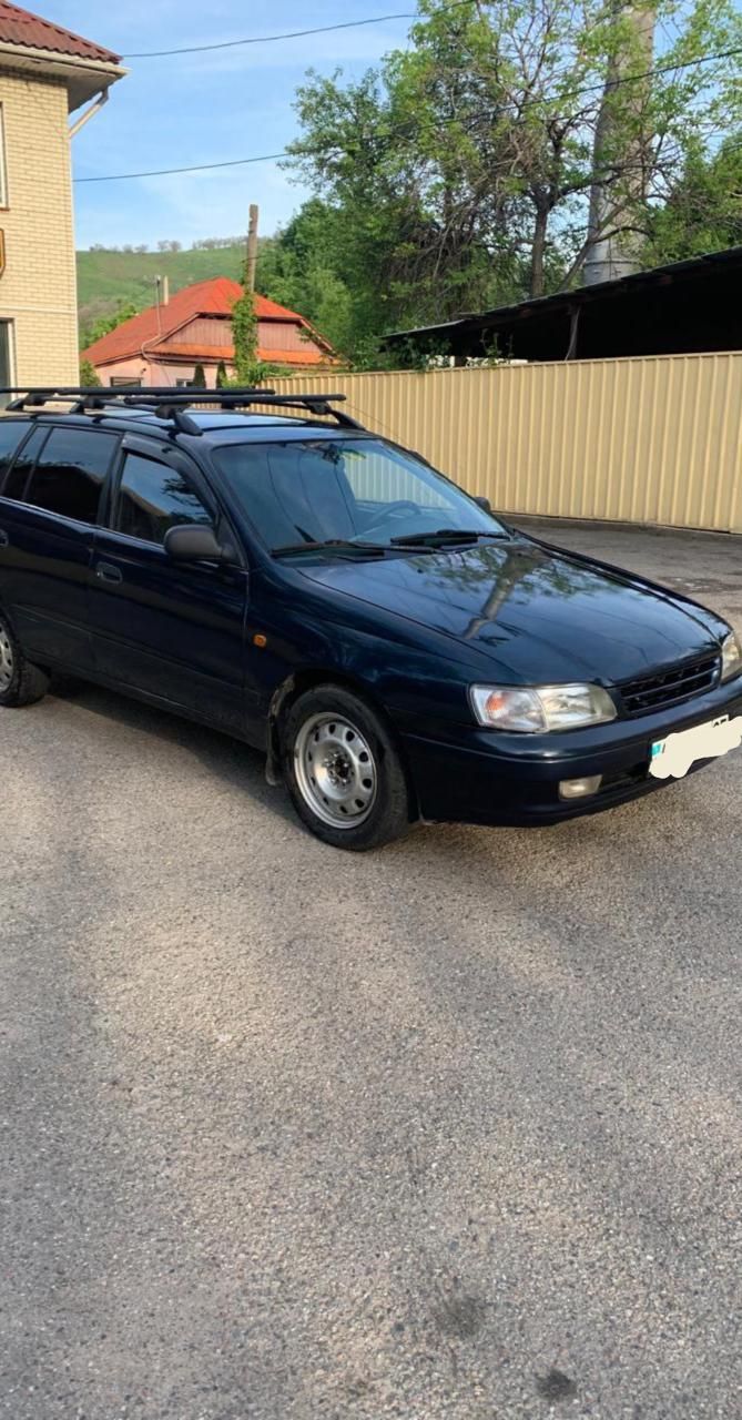 Toyota Carina E  1994 г. в объем  2куб торг будет с капотам