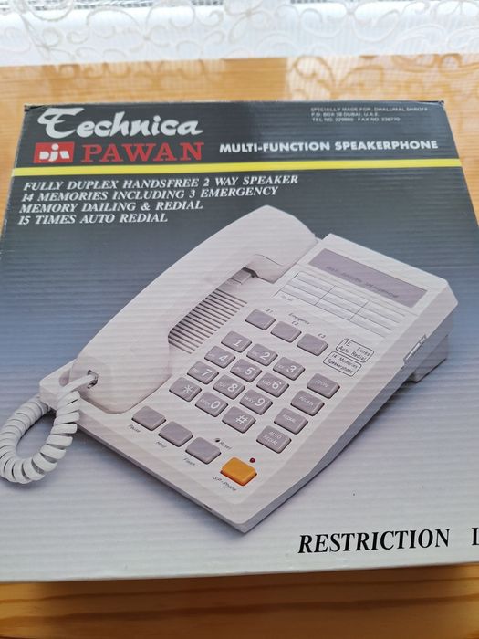 Стационарен телефон.