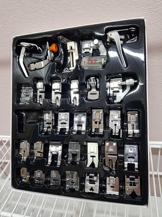 Набор лапок для швейной машинке.