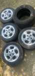 Vând cauciucuri cu genti de aluminiu pt.Peugeot 306 -175/66/14,bune